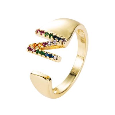 China New Fashion Couples 26 Letter Rings Copper Rings 18k Gold Plated Male And Female Hip Hop Micro-Inlaid Colorful Zircon Rings for sale