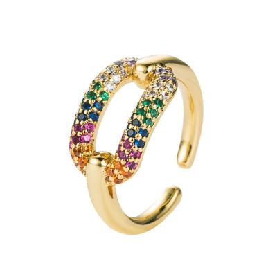 China FASHIONABLE new style hip hop copper inlaid colorful ring for men and women with gold plated fashion geometric ring for sale