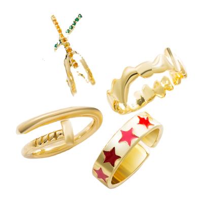 China FASHIONABLE Drip Oil Vintage Gold Star Ring Personality Brass Plated Long Ring With Adjustable Opening Geometric Ring for sale