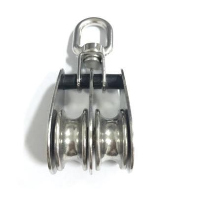 China Wear Resistance Corrossion Marine Boat Stainless Steel Swivel Eye Wire Rope Double Pulley Block (M25-M50) for sale