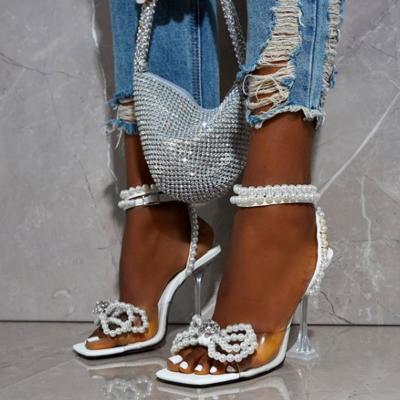 China Fashion Trend Women's Bowtie Spike Heel Women's Sandals Rhinestone Square Toe Strap High Heels Narrow Band Sandals for sale