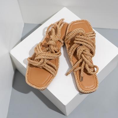 China Fashion Trend Classic Hemp Rope Cross Tie Hollow Out Flat Outdoor Beach Women Sandals Ladies Casual Shoes Summer for sale