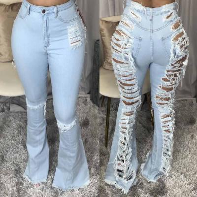 China High Waist Anti-Static Perforated Rocket Jeans Plus Size Fashion Rocket Trend Bell Bottom Distressed Denim Ripped Women Jean for sale