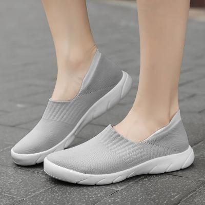 China Rubber Walking Style Shoes Women Female Sports Shoes Women Running Casual Socks Sneakers for sale