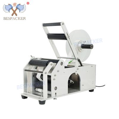 China Food Semi-automatic Self Adhesive Sticker Labeling Machine for Oil Juice Plastic Bottles Wine for sale