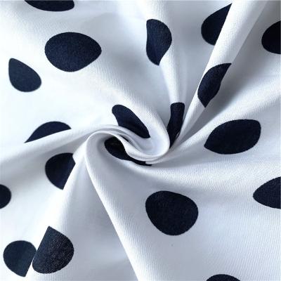 China Classic anti-static polka dot reactive printing 100%Cotton woven poplin shirtfabric printed shirt fabric for shirts and skirts for sale