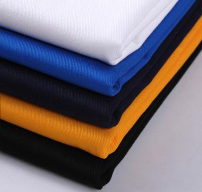 China Stock cotton woven plain dyed fabric Shrink-resistant lot T/C cvc twill fabric for workwear/school uniform/pants for sale