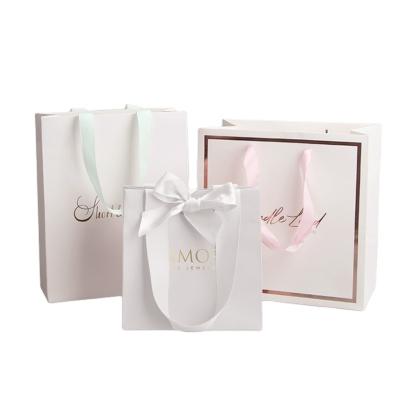 China Recyclable White Purse Gift Bag Recyclable Jewelry Cosmetics Paper Pouch Card Paper Pouch Bags Custom Paper Shopping Bags With Your Own Logo for sale