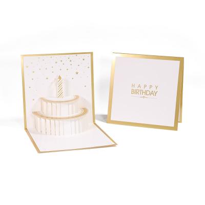 China Hot Wholesale 3D Europe Gold Birthday Card Gold Cake Stamping Hand Hollowed Out Birthday Cards for sale