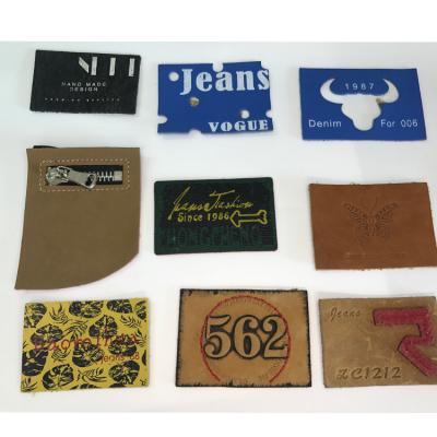 China Sustainable Custom Leather Label PU Embossed Color Print Leather Label For Bags for sale