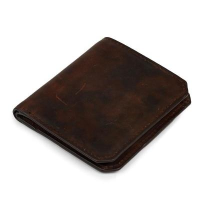 China Men's Vintage Waterproof Popular Slim Card Holder Blocking Rfid Unisex Security Purse Genuine Leather Traveling Wallet For Male for sale