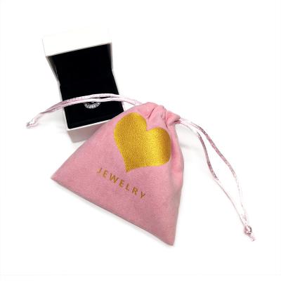 China Small Jewelry Suede Jewelry Pouch Bag With Gold Logo for sale