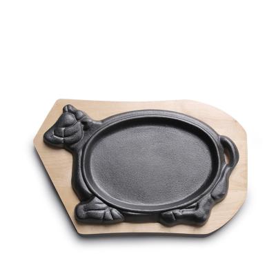 China Modern Hot Selling Cow Shape Cast Iron Sizzling Dish And Steak Pan With Wooden Base for sale