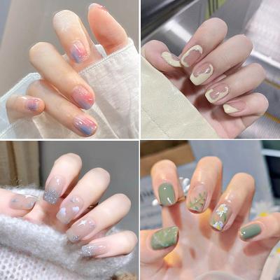 China Salon Graffiti Square Short Fake Nails Art Lattice Press On Fake With Designs Set Clear Gradient Nail Tips Kiss Display Tipsy Stick for sale