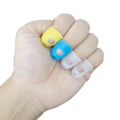 China Viable Colorful Silicone Finger Protector Cover Device Cap Silicone Finger Protector Cradles For Playing Guitar for sale