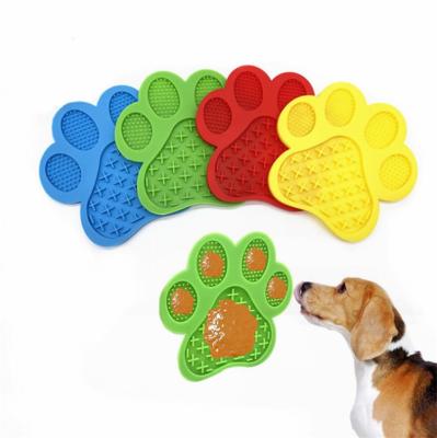 China Easy Viable Grooming Slow Feeder Bowl With Suction Cups Paw Shape Silicone Pet Dog Feeding Mat for sale