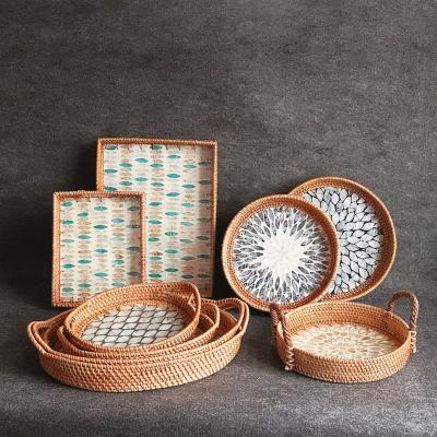 China Hand - 2021 Rustic Round Woven Wooden Desktop Rattan Shell Serving Tray Storage Basket For Breadfruit for sale