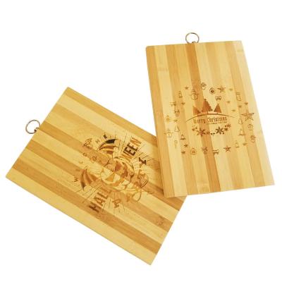 China Sustainable Christmas Halloween Laser Engraved Wholesale Commercial Bamboo Chopper Cutting Board for sale