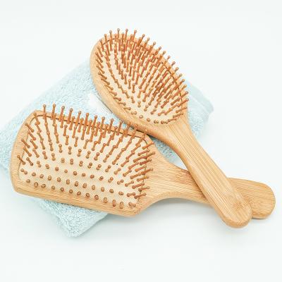 China Eco-friendly Logo Natural Wooden Bamboo Brush Massage Hair Beauty Care Custom Pneumatic Hair Brush for sale