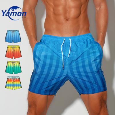 China Custom Anti-wrinkle Logo Quick Dry Breathable Men Clothing Beach Shorts For Men for sale