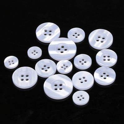 China Wholesale Dry Cleaning Around 4-Holes Resin Buttons For Transparent Clothes And Shiny Shirt Button for sale