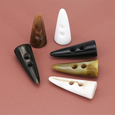 China Sustainable Hot Sale Plastic Horn Button Buckle Garment Accessories For Clothing for sale