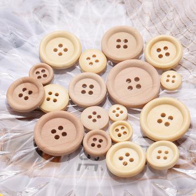 China Sustainable Wholesale Round 4-Holes Button Handmade Natural Color Wooden Buttons for sale