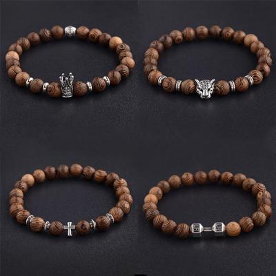 China CLASSIC Silver Wooden Bead Charm Turtle Cross King Crown Leopard Head Wooden Bangle Bracelet for sale