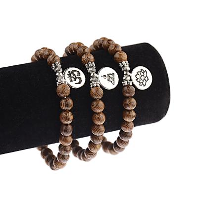 China CLASSIC Douvei Wood Beads Wooden Buddha Charm Tag Lotus Pattern Bracelet For Men for sale