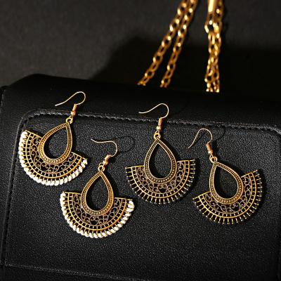 China 2021 Women Vintage Jhumka Ethnic Hollow Trible Water Gypsy Helix Shaped Drop Dangle Earrings Indian Jewelry Pendientes for sale