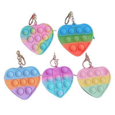 China Waterproof valentines day mini push up bubble doll toy heart shape noise it key chain silicone heart noise it key chain for valentine for sale