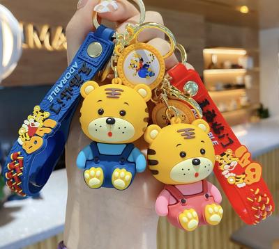 China PVC 2022 new year transformer tiger key chain llavero self-defense tiger key chain waterproof hanging year 3d cartoon tiger key chain for sale