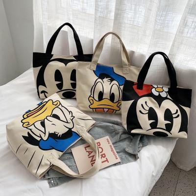 China Waterproof 2022 spring summer fashion famous brands women's luxury custom ladies' simple canvas shoulder handbag mickey mouse tote bag handbag for sale