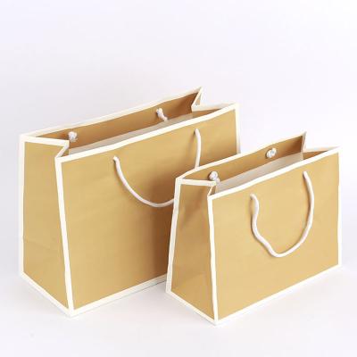 China Recyclable Custom Black Logo Print Grocery White Brown Kraft Paper Gift Bag With Handle Kraft Paper Gift Bag Printed Own Logo Wholesale for sale