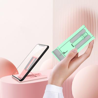 China Super Convenient Adjustable Gift Pink Cell Phone Stand Mobile Phone Stand Easy To Carry Foldable Cell Phone Stand for sale