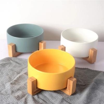 China New Design Multicolor Wholesale Non-automatic Round Ceramic Dog Food Bowl With Wooden And Bamboo Stand for sale