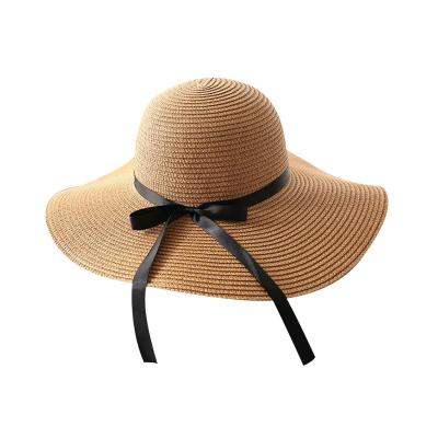 China Character lady fashion wide brim ribbon bow beach topee artificial straw knitted hat for sale