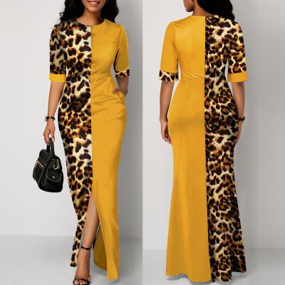 China Anti-wrinkle plus size casual pencil dresses office ladies round neck dress women short sleeve leopard print dresses party for sale