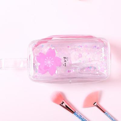 China 2019 Fashion Hot Sale Quicksand PVC Transparent Cosmetic Bag For Girls for sale