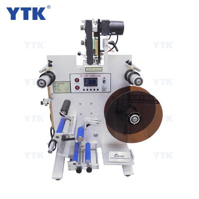 China SL-130 Food Round Bottle Labeling Machine Labeler For Wrap Around And Double Side Labels for sale