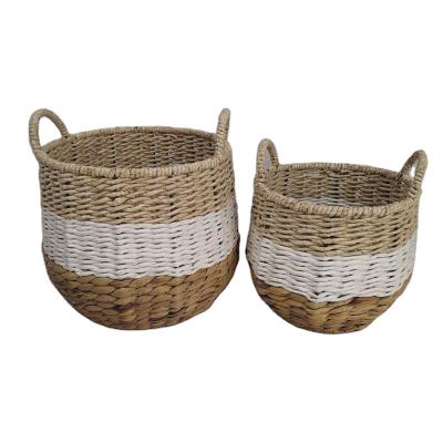 China Sustainable Fashion Storage Basket With Handy Handle Oval Straw Basket High Quality Storage Basket for sale