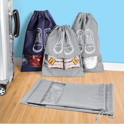 China Non Woven Shoe Bag PVC Clear Window Dustproof Drawstring Bag For Shoes for sale