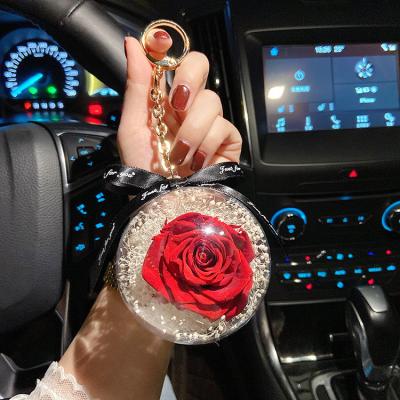 China Flower interior decoration for car creative immortal flower acrylic ball rose float car hanging interior decoration for sale