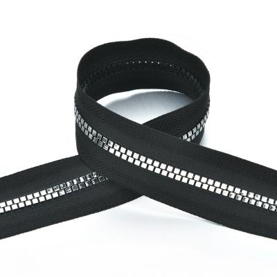 China Other Zipper 5# Cubic Shape Teeth Black Plastic Tape For Garment for sale