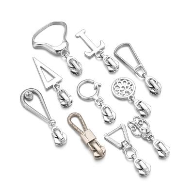 China Other Silver Shinning Zipper Pull Charms Fancy Zipper Head For Fashion for sale