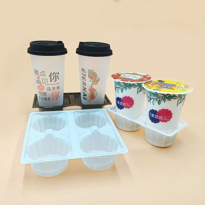 China Coffee Tea Water Milk Cup Holder PP Disposable Tray Plastic Customized Takeaway Cup Holder for sale