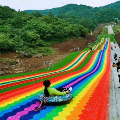 China Outdoor Amusement Park Equipment Rainbow Slide Kids Plastic Playground Slide for sale