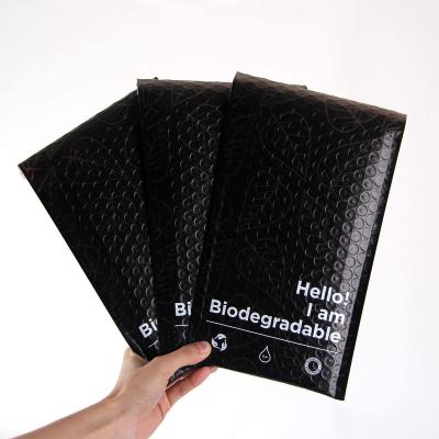 China BIODEGRADABLE Biodegradable compostable PLA PBAT plastic shipping mailing poly packaging bag custom black air bubble mailer padded envelopes for sale