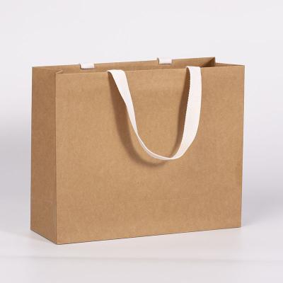 China Recycled Materials Exquisite Gift Card White Paper Bag With Polyester-cotton Lanyard Hot Melt Adhesive Kraft Paper Bag for sale