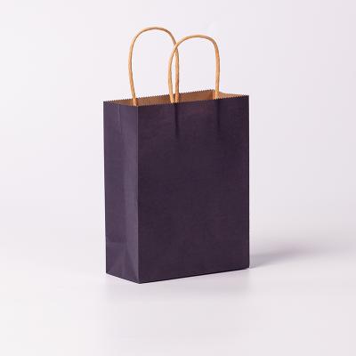 China High quality recycled materials paper bags with purple prints for creative use in the clothing and food industries for sale